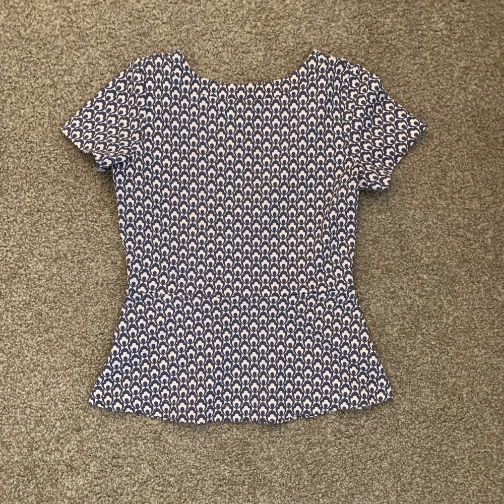 Ann Taylor Peplum top with open back